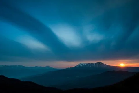 Scenic sunset in the mountains Stock Photos