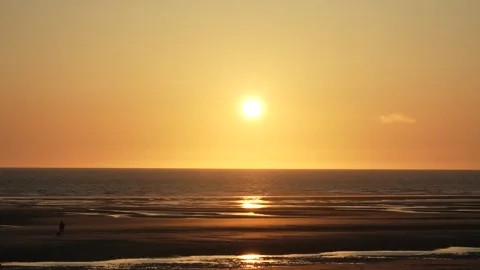 Scenic sunset over beach sunrise Opal Coast sun on a clear empty skyline Video stock 332236724