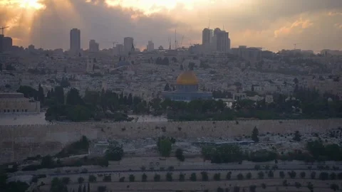 Scenic sunset view captured over Jerusalem's Old City and Al-Aqsa Mosque Stock Footage 343998689