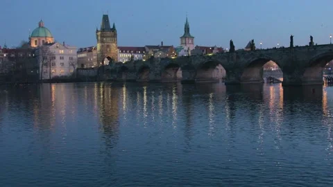 Scenic sunset view of the Charles Bridge over Vltava river in Prague, Czech R Stock Footage 135540500