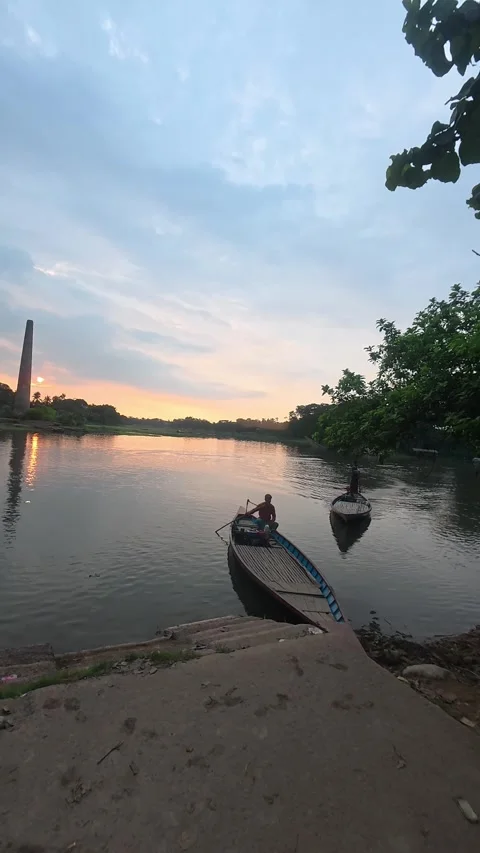 Scenic sunset view over a quiet river with reflected in water Stock Footage 342158511