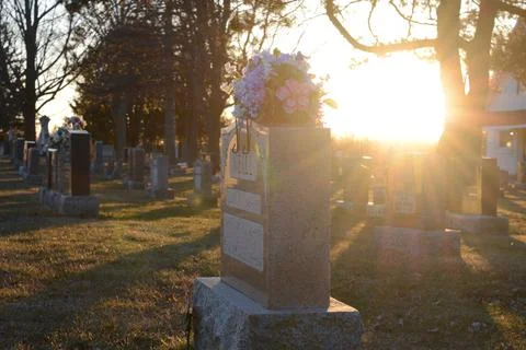 Scenic Sunsetting Graveyard Stock Photos