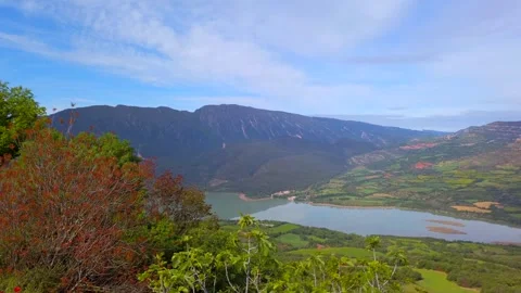Scenic Terradets Lake View With Red Autumn Foliage in Llimiana, Catalonia Stock Footage 335330947