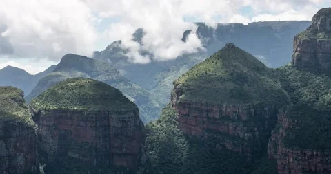 Scenic time lapse of drifting clouds over mountain at Blyde river canyon Stock Footage 150962456