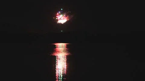 Scenic time lapse of New Year fireworks in Australia on Lake Macquaire as 4k. Stock Footage 265314686