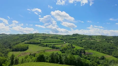 Scenic Timelapse of Clouds Moving Over Rolling Green Hills in Piedmont Italy Stock Footage 335195145