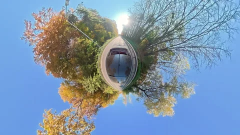 Scenic tiny planet view 360 panorama of a road trip in autumn, Spherical Stock Footage 320339558