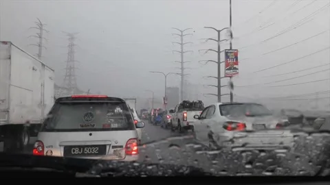 Scenic traffic jam view through a car windshield due to raining. Видео 145494732