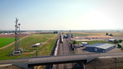 Scenic Train Aerial View through Farmland 動画素材 159659962