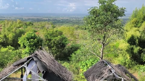 Scenic Tropical Valley Overlook from Rustic Hilltop Huts Stock Footage 340465663