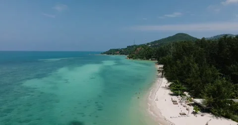 Scenic turquoise beach with lush trees. Ko Pha Ngan, Thailand. Stock Footage 320176654