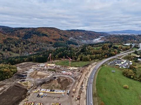 Scenic valley construction, development project involving course roadway and Stock Photos