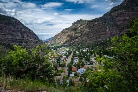 Scenic Valley View with Mountain Cliffs and Green Trees in Ouray, Colorado Stock Photos