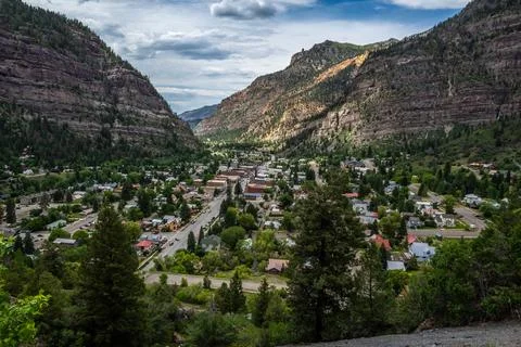 Scenic Valley View with Mountain Cliffs and Green Trees in Ouray, Colorado Photos