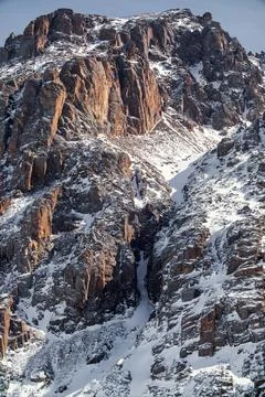 Scenic vertical background of reddish rock in the mountains of Central Asia Tien Stock Photos