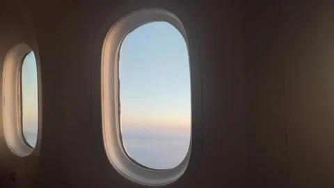 Scenic view from an airplane window overlooking the sparkling sea near Barcelona Vídeos de archivo 313201359