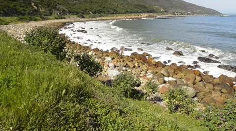 Scenic view along the coastal road at the back of famous Table Mountain Stock Footage 59554453