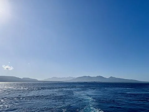 Scenic View of Bali Strait with Deep Blue Ocean and Clear Sky Overlooking t.. Stock Photos