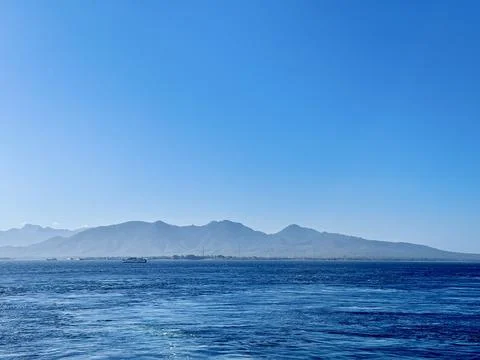 Scenic View of Bali Strait with Deep Blue Ocean and Clear Sky Overlooking t.. Stock Photos