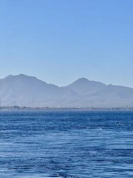 Scenic View of Bali Strait with Deep Blue Ocean and Clear Sky Overlooking t.. Stock Photos