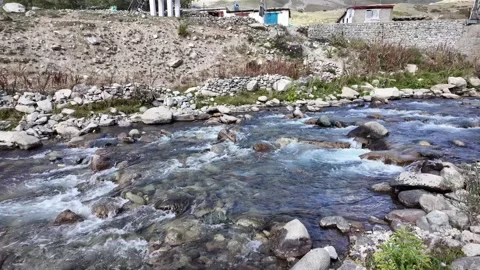 Scenic View A Beautiful Forest River Flowing Rapidly Between Rocky Shores, w Stock Footage 288465413