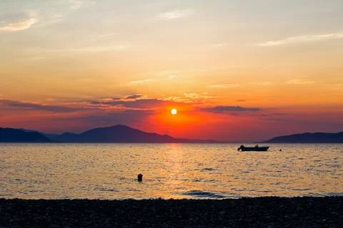 Scenic view of beautiful sunset in the evening time over the sea Stock Photos