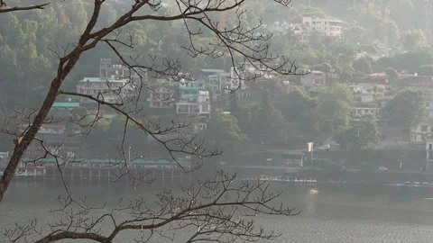 Scenic view of Bhimtal lake with distant buildings Video stock 334326992