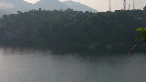 Scenic view of Bhimtal lake surrounded by hills Video stock 334327408
