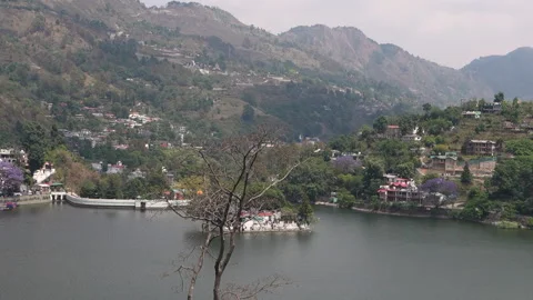 Scenic view of Bhimtal lake surrounded by hills Video stock 334328557