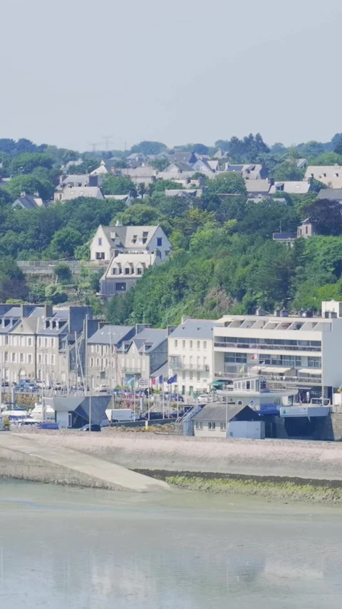 A scenic view of Binic, a coastal town in Brittany, France, showing the beach Stock Footage 346663431