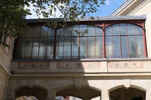 Scenic view of a bridge between two buildings found in the city of Paris, France Stock Photos