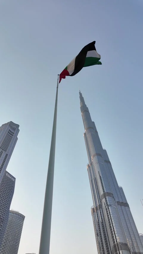 Scenic view of Burj Khalifa and UAE flag from Burj Park in Dubai. Stock Footage 342887692