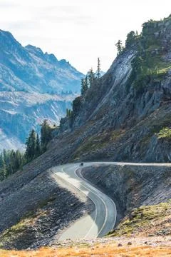 Scenic view of curve and slope asphalt road on the mountain on the day in sum Stock Photos