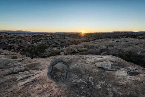 Scenic view of dramatic landscape against clear sky during sunset at Canyonlands Stock Photos