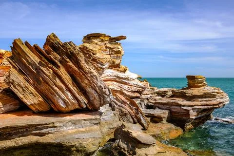 Scenic view of dramatic rock formations along the coastline at Broome Stock Photos