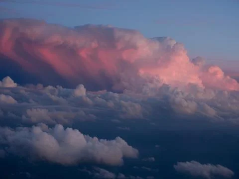 Scenic View Of Dramatic Sky clouds During Sunset, from plain Stock Photos