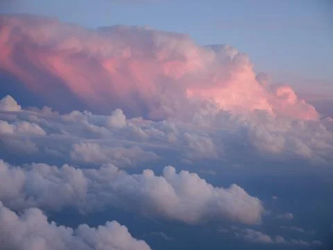 Scenic View Of Dramatic Sky clouds During Sunset, from plain Stock Photos