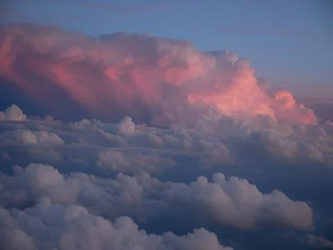 Scenic View Of Dramatic Sky clouds During Sunset, from plain Stock Photos