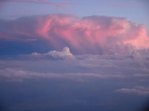 Scenic View Of Dramatic Sky clouds During Sunset, from plain Stock Photos