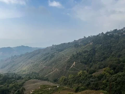 A Scenic view of Eastern himalayan range of mountains from a cafe in Kurseong Stock Photos