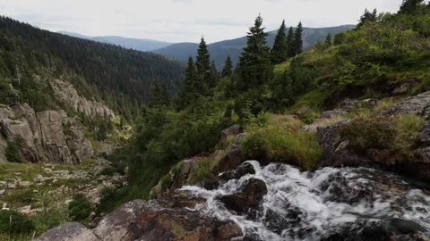 Scenic view of Elbe Waterfall flowing into Elbe Valley under a cloudy sky, .. Stock Footage 340457339
