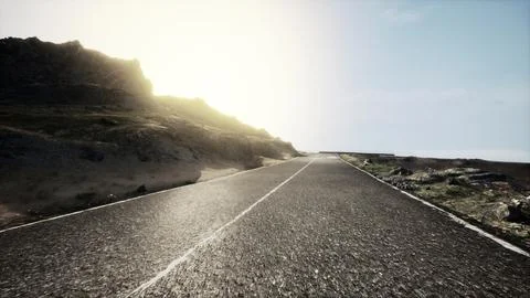 Scenic view of empty road amidst volcanic landscape Stock Illustration