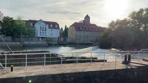 Scenic view of the Ems river weir in Rheine, Germany, featuring historic bu.. Stock Footage 340071367