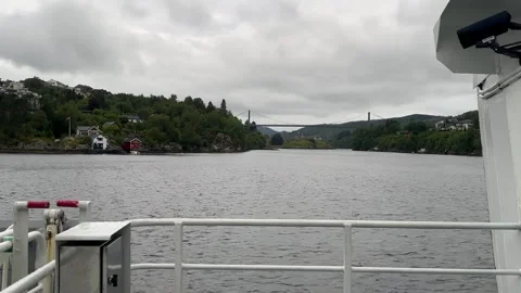 A scenic view from a ferry as it cuts through calm waters Stock Footage 314097738