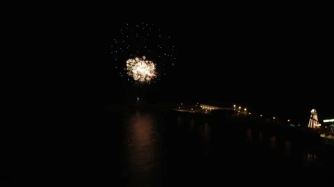 Scenic view of fireworks exploding on the seacoast Stock Footage 222848789