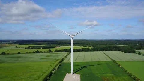 Scenic View Of Green Fields And Wind Farm With Functioning Wind Turbines - 動画素材 200821789