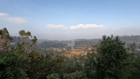 Scenic view from a high viewpoint overlooking Kodaikanal and its lake in So.. Stock Footage 306157350