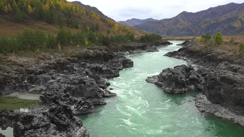 Scenic view of Katun mountain river flowing along the rocky terrain, Altai Stock Footage 143251643
