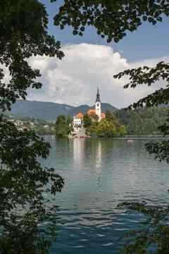 Scenic view of Lake Bled with iconic island church Cerkev Marijinega vnebovzetja Stock Photos