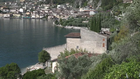 Scenic view of Lake Garda framed by olive trees in Northern Italy Stock Footage 341331010